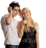 Young Couple With Headphones And Microphone Stock Photography