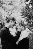 Young Cute Romantic Beautiful Loving Couple Face to Face Looking into Each Others Eyes Outside in Nature royalty free stock photos Young Cute Romantic Beautiful Loving Couple Face to Face Looking into Each Others Eyes Outside in Nature royalty free stock photos