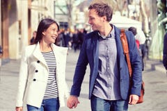 Young dating couple flirting walking in city royalty free stock images Young dating couple flirting walking in city royalty free stock images
