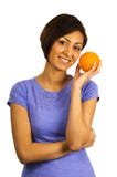 Young Ethnic Woman Holds An Orange. Royalty Free Stock Photos