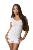 Young ethnic woman in white t-shirt and shorts