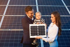 Young Family Getting To Know Sources Of Alternative Energy Stock Photos