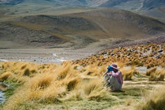 Young female traveller is using binoculars to see remoted objects Stock Photo Young female traveller is using binoculars to see remoted objects Stock Photo