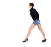 Young Female With Long Legs Standing Over White Stock Photo