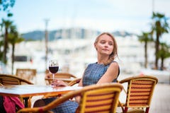 Young French woman drinking red wine royalty free stock photos Young French woman drinking red wine royalty free stock photos