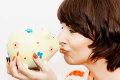 Young funny woman with decorative piggy bank royalty free stock photo Young funny woman with decorative piggy bank royalty free stock photo