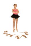 Young girl ballerina surrounded by ballet shoes ar royalty free stock photo Young girl ballerina surrounded by ballet shoes ar royalty free stock photo