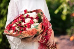Young girl with a bouquet of flowers from roses royalty free stock photos Young girl with a bouquet of flowers from roses royalty free stock photos