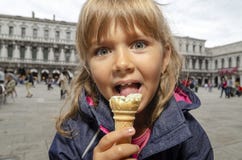 Child eating icecream in Venice