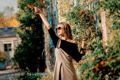 Young Girl In Dress And Black Clothes Near House Royalty Free Stock Photography Young Girl In Dress And Black Clothes Near House Royalty Free Stock Photography