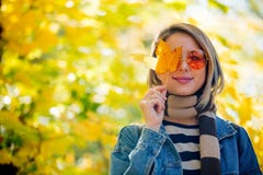 Young Girl In The Park In Autumn Season Time. Royalty Free Stock Image