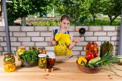 Young Girl Preparing Fresh Vegetables for Canning stock photography Young Girl Preparing Fresh Vegetables for Canning stock photography