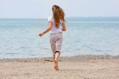 Young Girl Running On Beach Royalty Free Stock Photo Young Girl Running On Beach Royalty Free Stock Photo