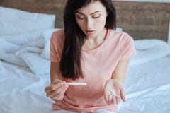 Young girl scared by pregnancy test results royalty free stock images Young girl scared by pregnancy test results royalty free stock images