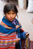 Young girl selling crafts