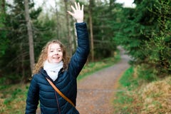 Young girl tourist in black jacket on walking trail in th forres stock images Young girl tourist in black jacket on walking trail in th forres stock images