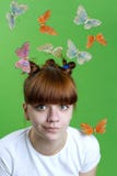 Young Girl With Flying Butterflies Stock Photo