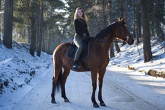 Young Girl With Horse On Winter Forest Road Stock Photo Young Girl With Horse On Winter Forest Road Stock Photo