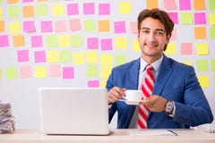 The young handsome man in conflicting priorities concept stock images The young handsome man in conflicting priorities concept stock images