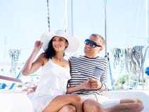 https://thumbs.dreamstime.com/t/young-happy-couple-relaxing-vacation-boat-rich-attractive-sailing-image-taken-summer-41938405.jpg