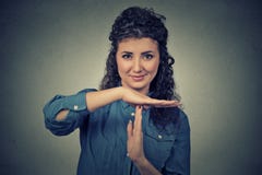Young, happy, smiling woman showing time out gesture with hands Stock Image Young, happy, smiling woman showing time out gesture with hands Stock Image