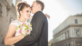 Young happy wedding couple bride meets groom on a wedding day. Happy newlyweds on terrace with gorgeous view. stock photography Young happy wedding couple bride meets groom on a wedding day. Happy newlyweds on terrace with gorgeous view. stock photography