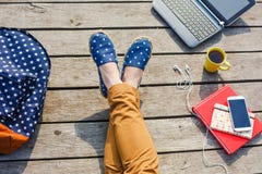 Young hipster girl have a break while studying outdoor royalty free stock photo Young hipster girl have a break while studying outdoor royalty free stock photo