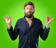 Young hipster man with beard and shirt royalty free stock photography Young hipster man with beard and shirt royalty free stock photography