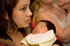 Young Hispanic Mother And Newborn Infant Stock Images