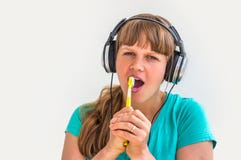 Young lady brushing teeth in the morning stock photo Young lady brushing teeth in the morning stock photo