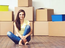 Young loving couple moving to a new house. Home and family concept. Royalty Free Stock Photos Young loving couple moving to a new house. Home and family concept. Royalty Free Stock Photos