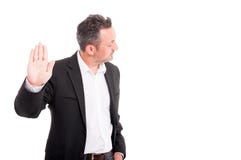 Young male rising up one hand Stock Images Young male rising up one hand Stock Images