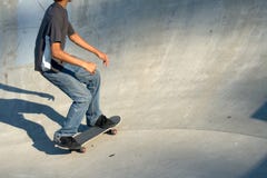 Young Male Skateboarder In The Pit Royalty Free Stock Photos