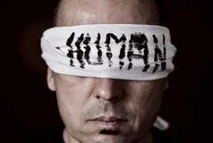 Young man with a blindfold in his eyes royalty free stock images Young man with a blindfold in his eyes royalty free stock images