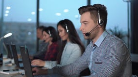 Young man in call center