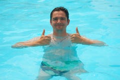 Young Man Gives Gesture Swiming Stock Photos