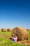 Young Man On The Harvested Field Royalty Free Stock Image