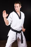Young man ready to fight on black with path stock image Young man ready to fight on black with path stock image