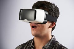 Young Man Wearing Virtual Reality Headset royalty free stock images Young Man Wearing Virtual Reality Headset royalty free stock images