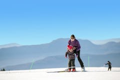 Young mother and daughter on ski vacation royalty free stock images Young mother and daughter on ski vacation royalty free stock images