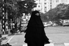 Young muslim lady walking in the city streets unique photo stock photography Young muslim lady walking in the city streets unique photo stock photography