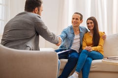 Young optimistic couple satisfied with therapy royalty free stock photography Young optimistic couple satisfied with therapy royalty free stock photography