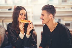 Young people in casual clothes eating pizza Stock Photo Young people in casual clothes eating pizza Stock Photo