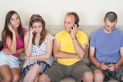 Young People On Their Phones Royalty Free Stock Image