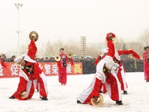 Young People Perform Yangge In The Snow Stock Image Young People Perform Yangge In The Snow Stock Image