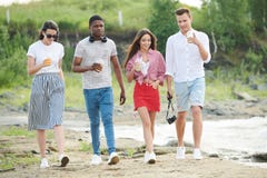 Young people walking outdoors royalty free stock photo Young people walking outdoors royalty free stock photo