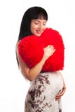 Young Pregnant Girl Hugging A Soft Big Heart Stock Image Young Pregnant Girl Hugging A Soft Big Heart Stock Image