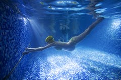 Young pregnant woman in swimming pool royalty free stock image Young pregnant woman in swimming pool royalty free stock image