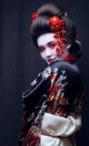 Young Pretty Geisha In Kimono With Sakura And Royalty Free Stock Photography