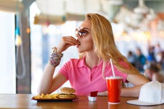 Young pretty woman resting in cafe Stock Photography Young pretty woman resting in cafe Stock Photography